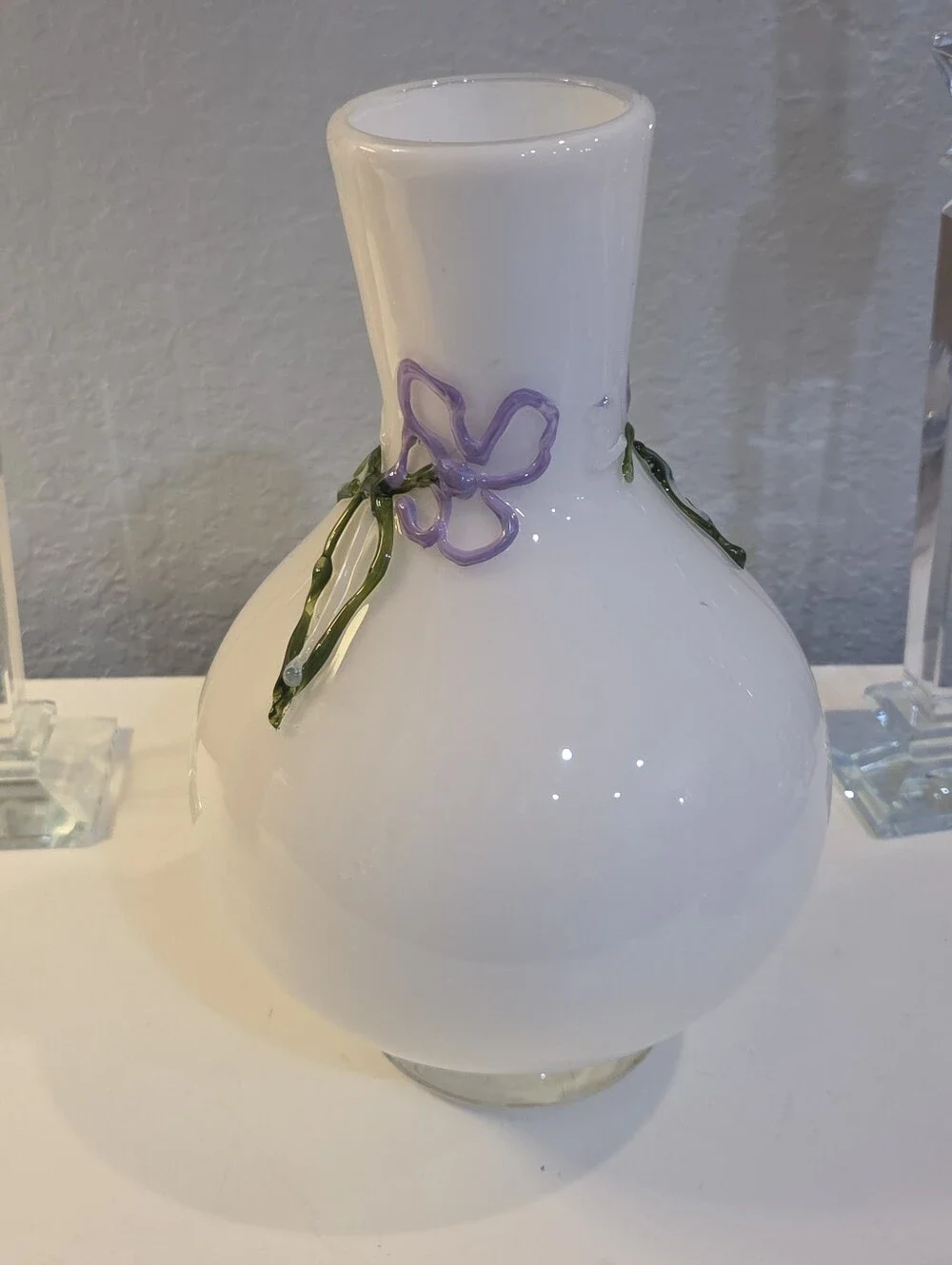 White Glass Vase With Raised Delicate Purple Flowers And Green Vines